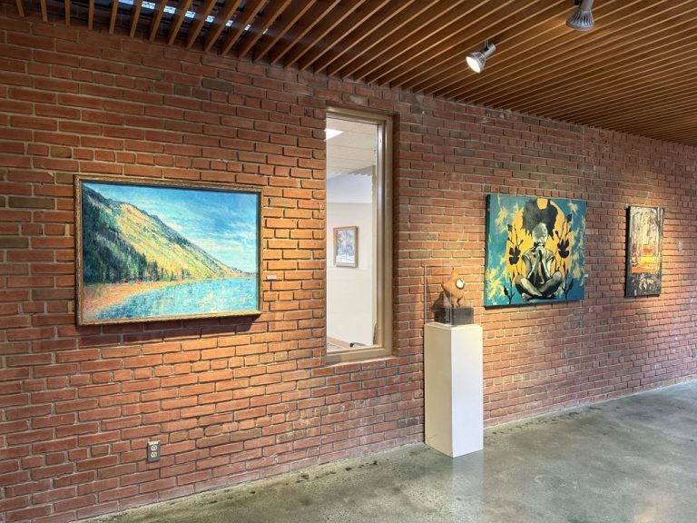 Artwork displayed on the wall inside City Hall